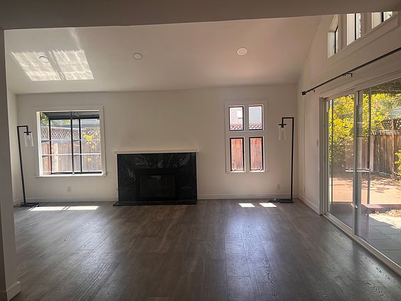 Spacious living room with unique windows