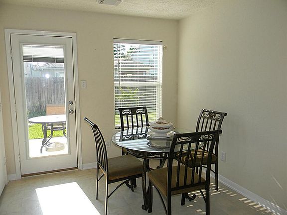 Dining area has convenient access to the patio.