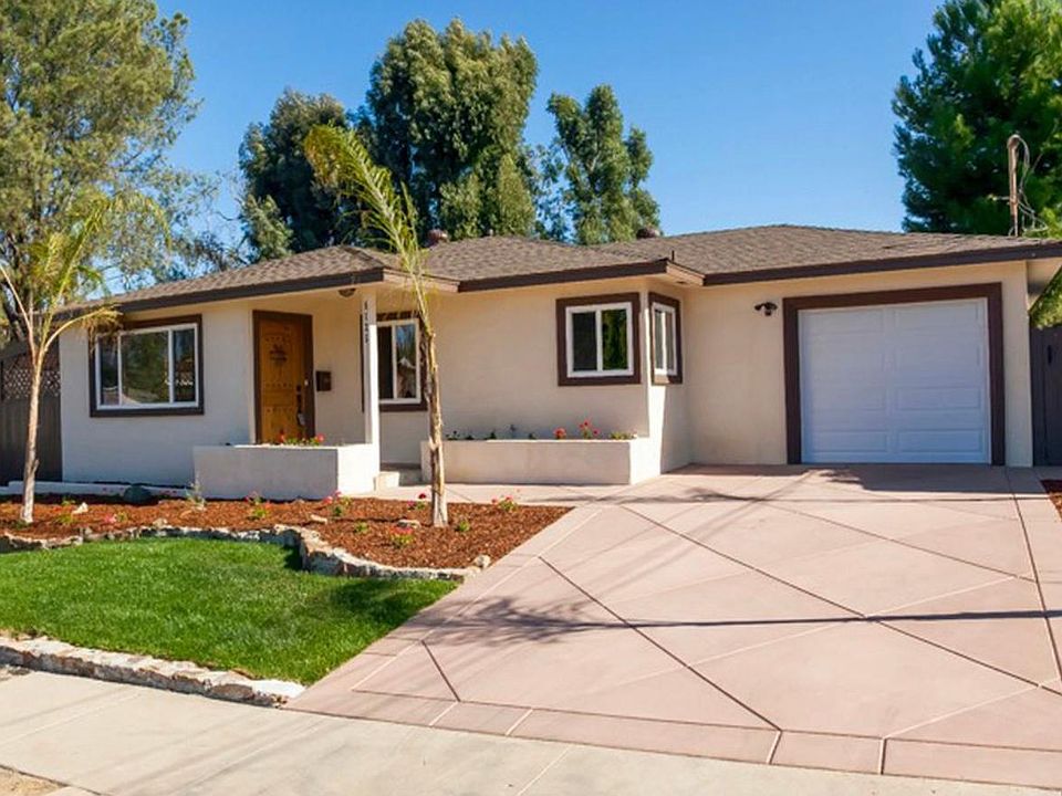 4 bed/2 bath home garage storage, two parking spaces in driveway Isn't she a cutie? :)