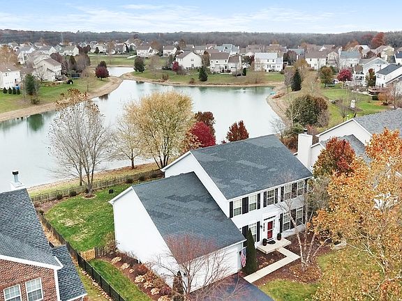 This home has it all PLUS a large fenced backyard with deck and  waterfront access.  Great for fishi