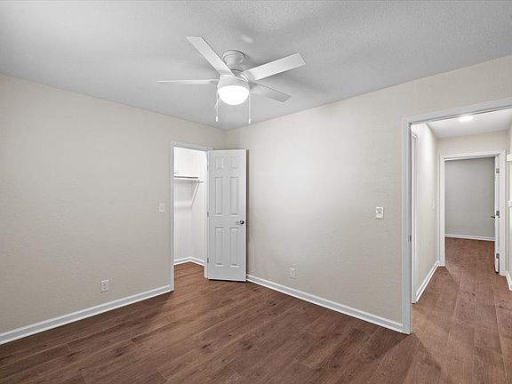 Spacious 2nd Bedroom with walk-in closet and ceiling fan