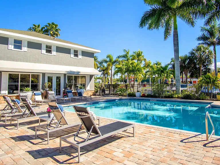 Immerse yourself in our welcoming community, where friendships bloom on our serene sundeck beside the inviting pool.