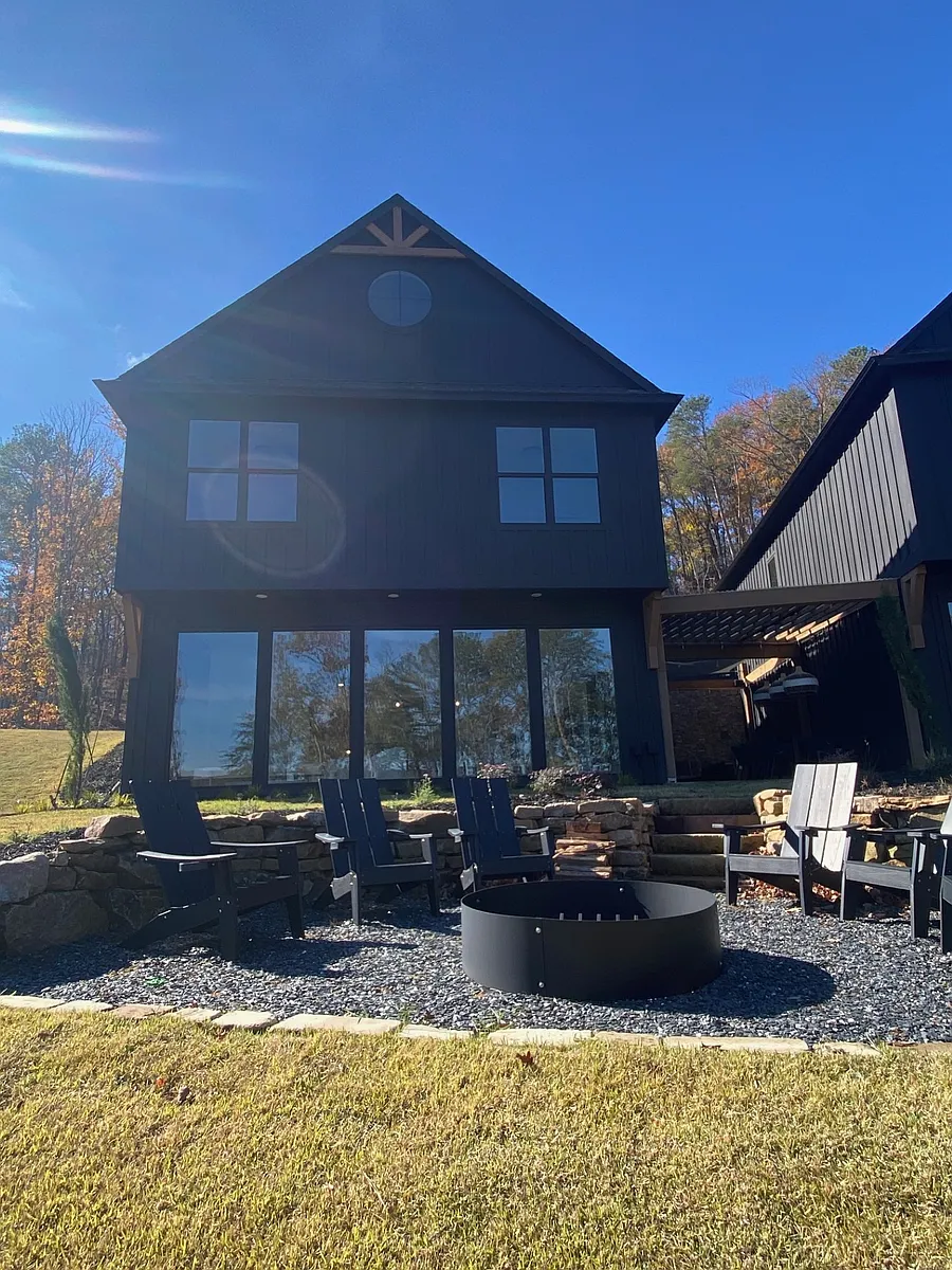 Photo 2 of 18 - 116 Marina Parc Dr - Waleska, GA Rear view of home, with firepit - 116 Marina Parc Dr