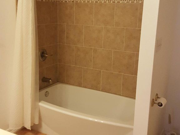 New Soaking Tub with Tile Wal
