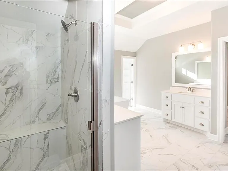 Master shower room and the door on the right takes to the laundry