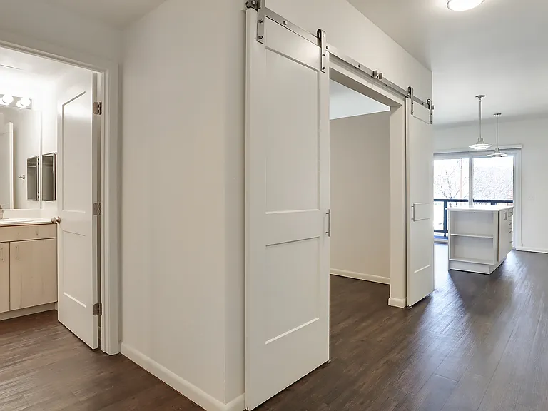 205 Bedroom and bathroom entrances, 203 has same "Rio Grande" layout, finishes & features