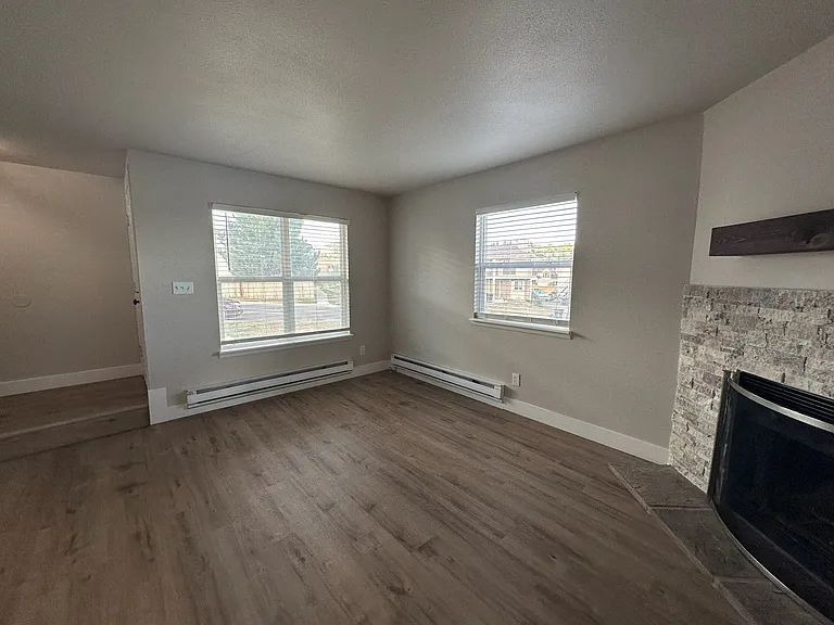 Two windows in the living room in this corner townhome.