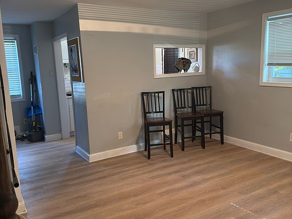 Living Room with view of Kitchen and Dining room