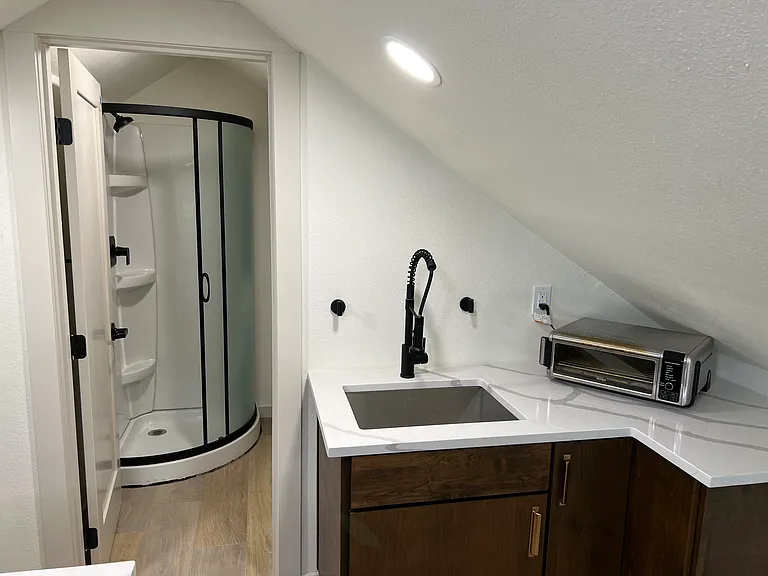 Upstairs sink and bathroom.