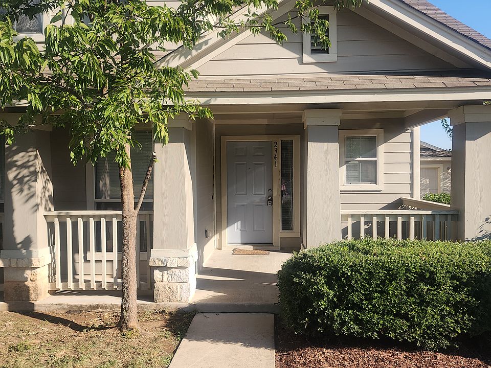 Front of House. Trees recently trimmed.