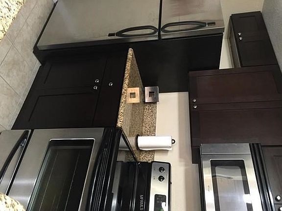 Stainless steel appliances in kitchen