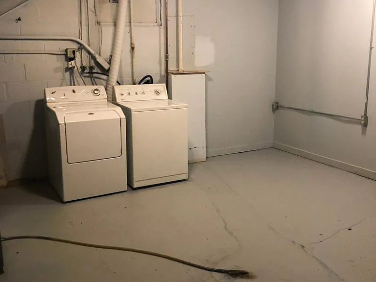 washer and dryer in basement