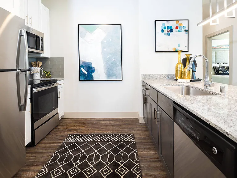 Enjoy cooking and socializing in your well-appointed kitchen, featuring ample counter space and modern appliances.