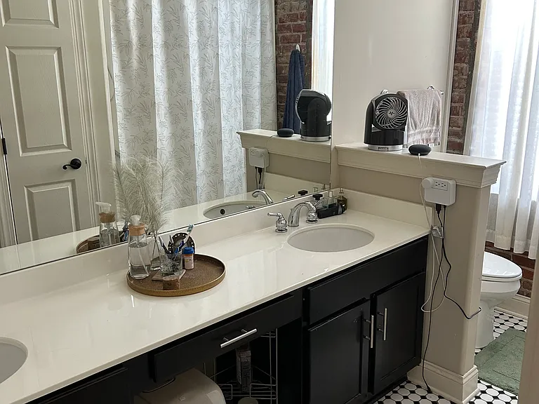 View of bathroom as one enters it.