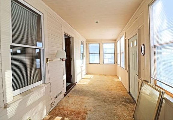 Heated enclosed front porch