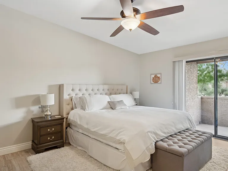 Master bedroom- Complete with private balcony, King bed, plenty of drawer and closet space, MASSIVE closet and shower with double sinks.
