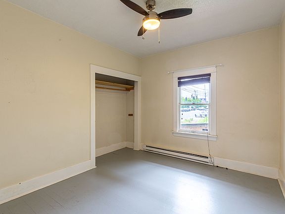 Softwood floors and ceiling fans in both bedrooms