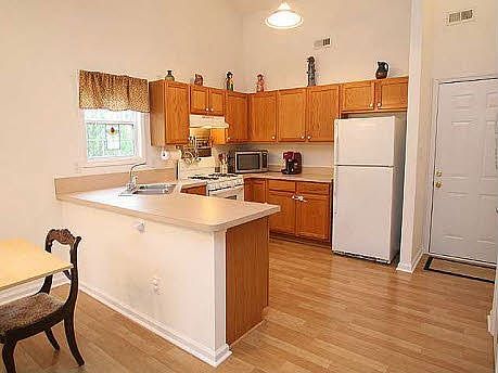 Kitchen, door to garage on right