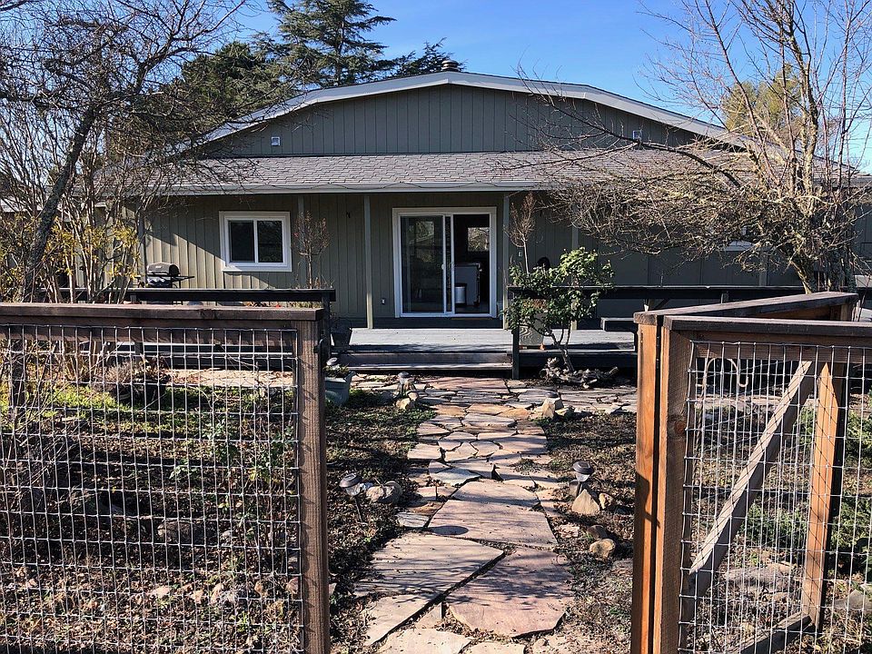 Back of house w large deck