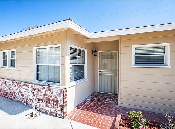 Entryway with brick flooring