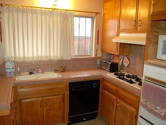 kitchen with updated tile countertops