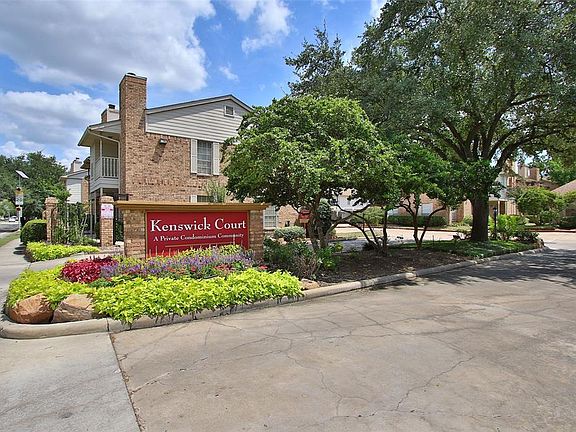 Notice the well-manicured lush landscaped complex