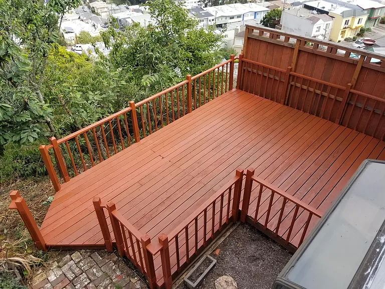 Large outdoor deck accessible from garage or first floor room. Expansive views.