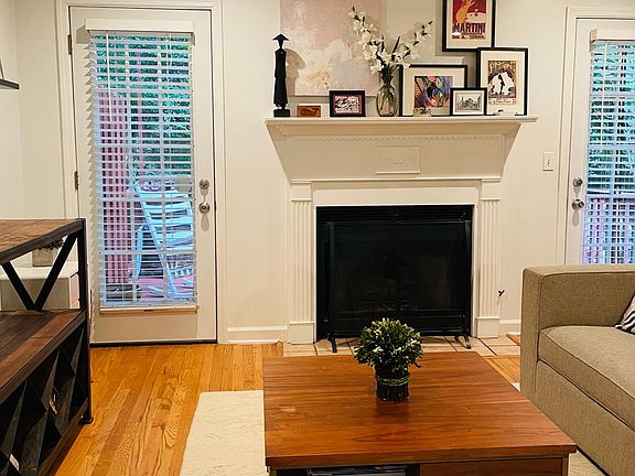 Living Room with gas fireplace. Two doors to outside deck.