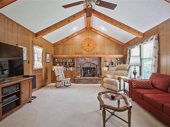 Large great room with gas fireplace and built-in.