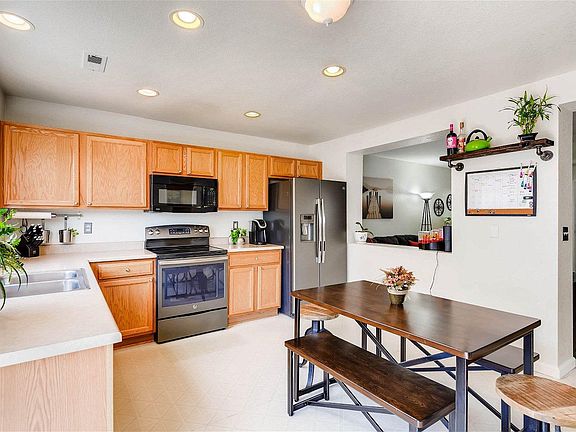 Kitchen prior to refresh to show side with eating space