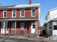 1st image of 11 W 1st St