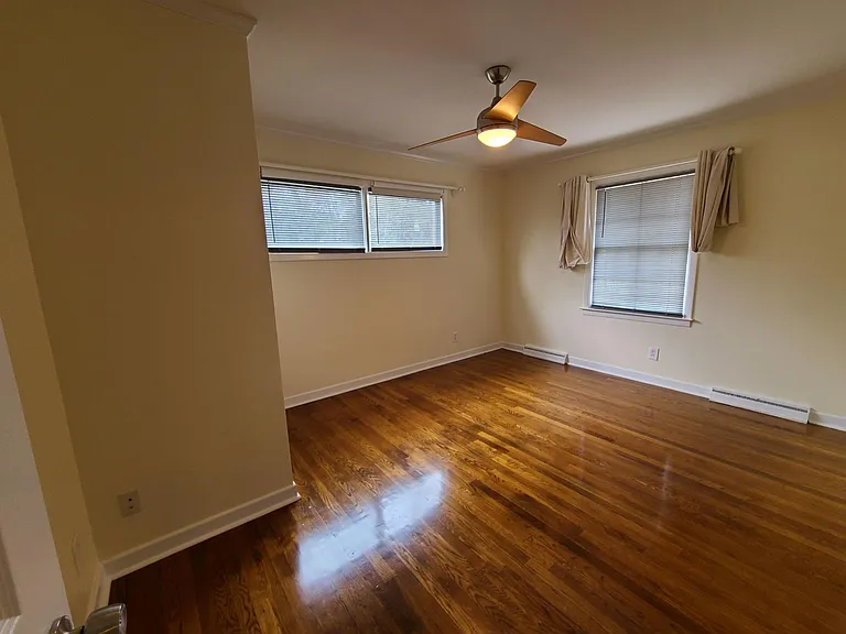 Sun and windows in the beautiful second bedroom upstairs.