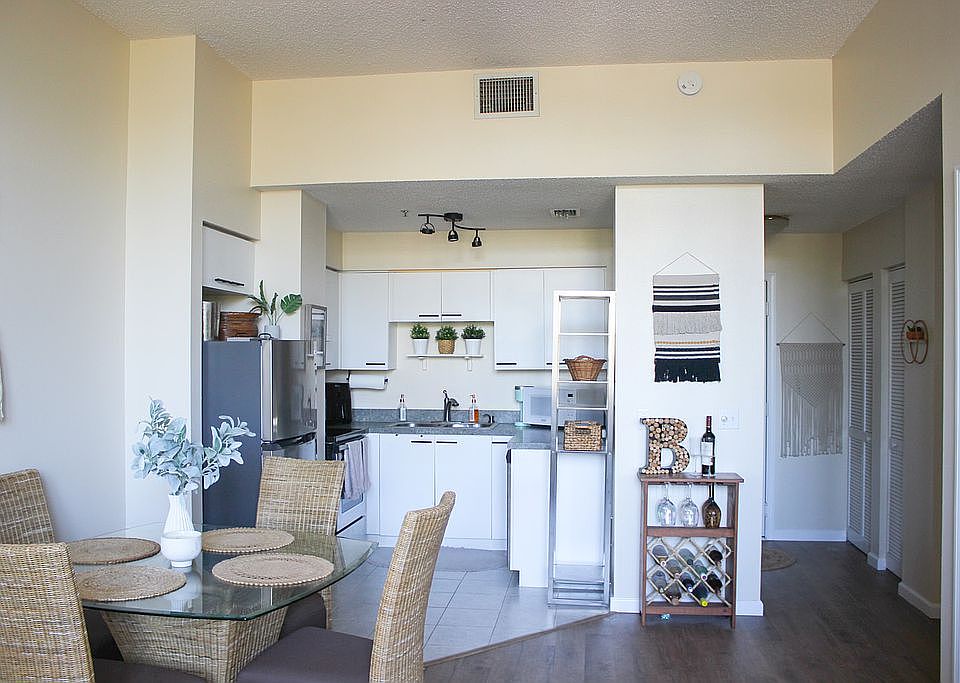 1st image of 701 Mirror Lake Dr N APT 303