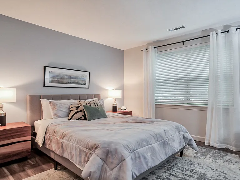 Spacious master bedroom fits any bed size