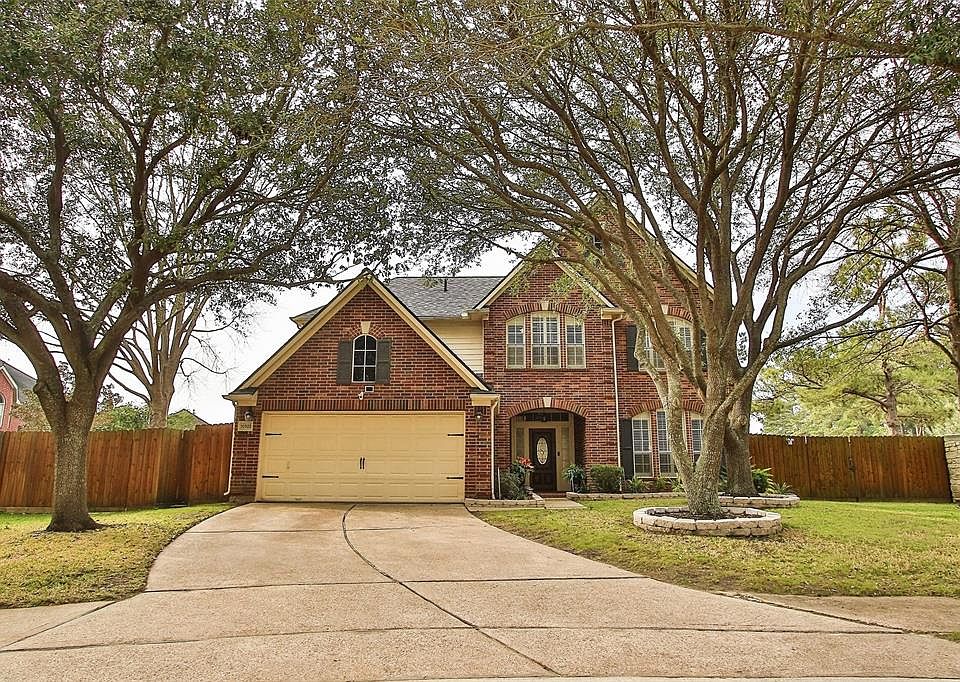 Large cul-de-sac lot w/mature trees & stately curb appeal.