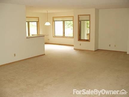 Living room into Breakfast Nook
						:
						Spacious living room with access to Brk Nook, MBR and guest BR, access to deck