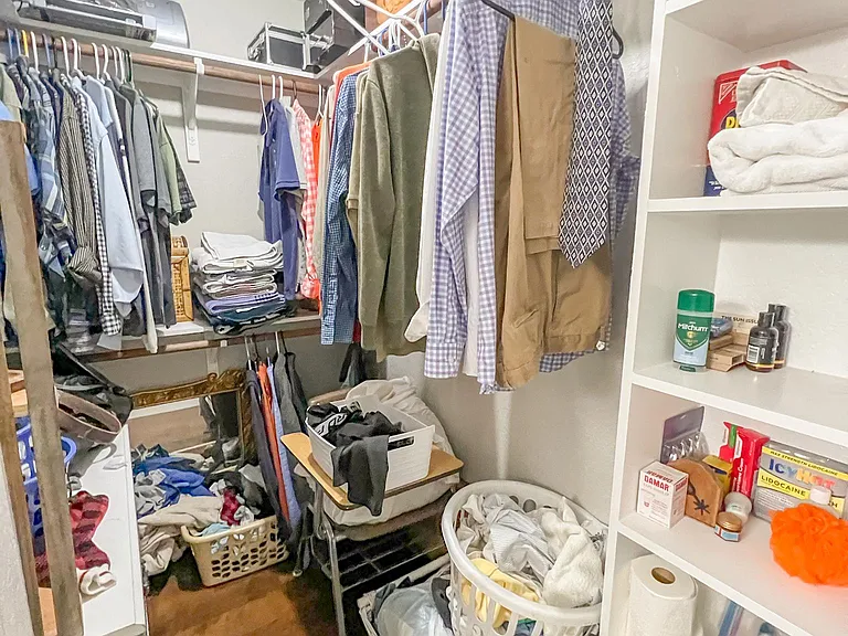 master closet with plenty of storage