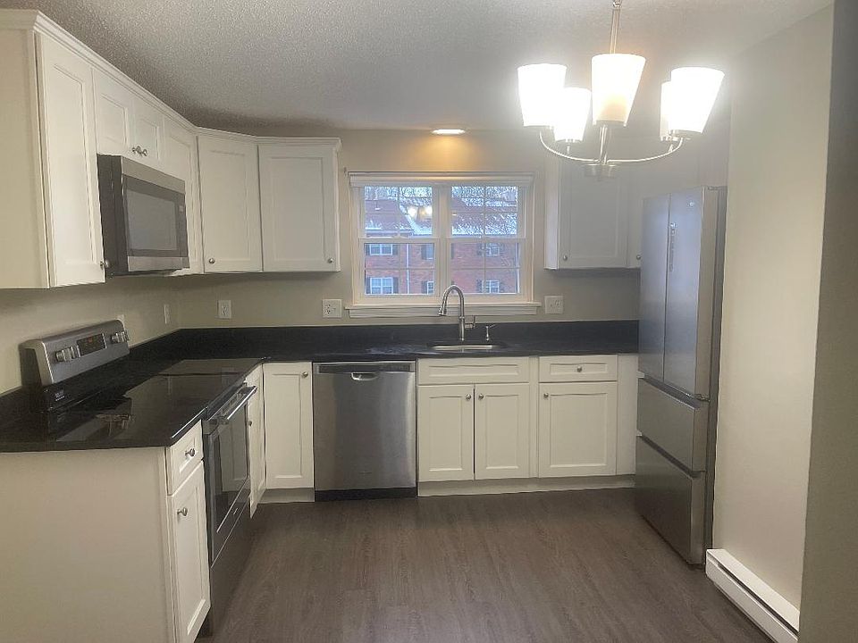 New white cabs, granite countertops, stainless appliances including french door frig, OTR microwave, and dishwasher and electric stove