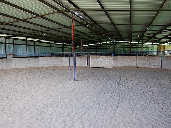 Another view of indoor riding pen