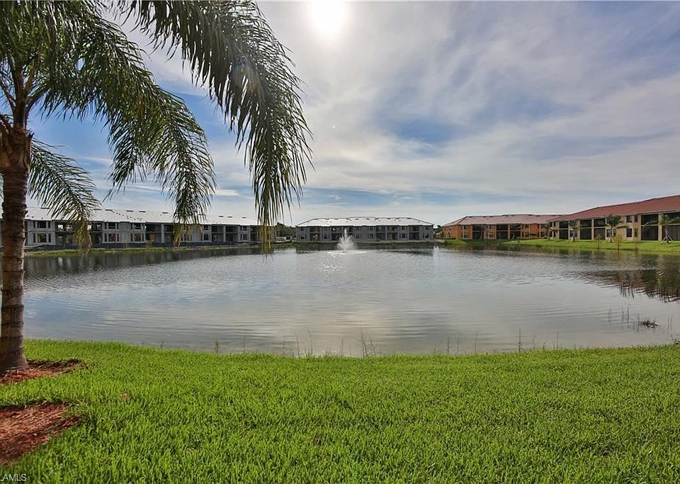 Lake and Fountain offer a nice backdrop view from the condo and screened lanai.