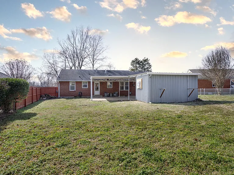Fully fenced yard for your furry friend