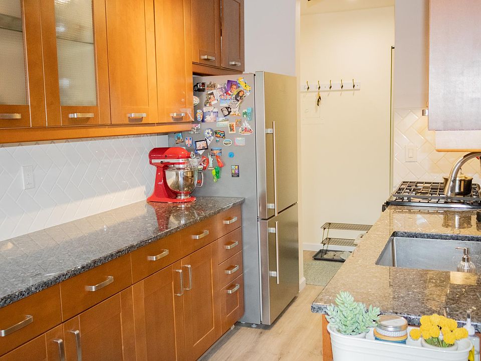 Stainless-steel appliances/fixtures. Real stone countertops. Soft-close cabinets.