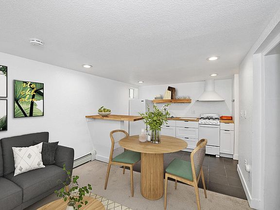 This image shows a virtually furnished space. This space come unfurnished.