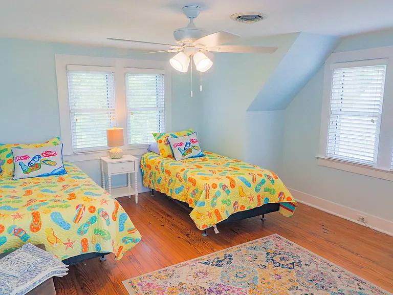 Upstairs bedroom with twin beds