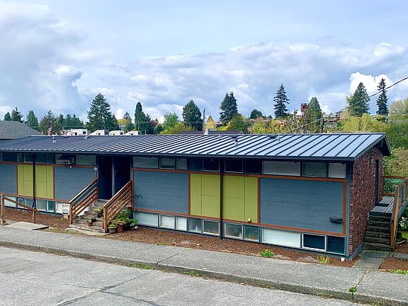 Apartment has new metal roof and sits on quiet street just blocks from the Alaska Junction in West Seattle