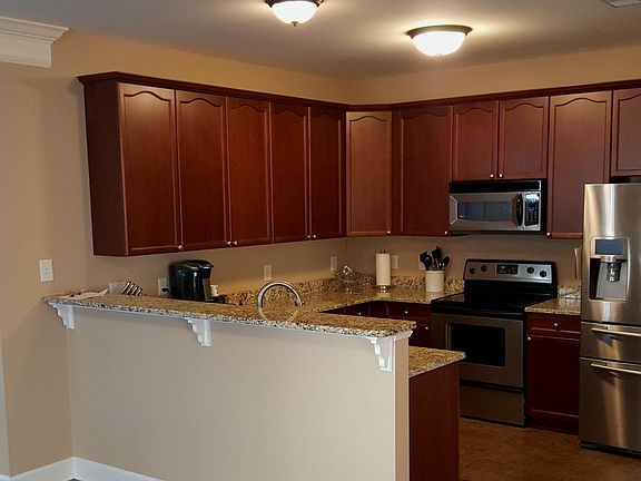Kitchen with Stainless Steel Appliances and Granite Counter