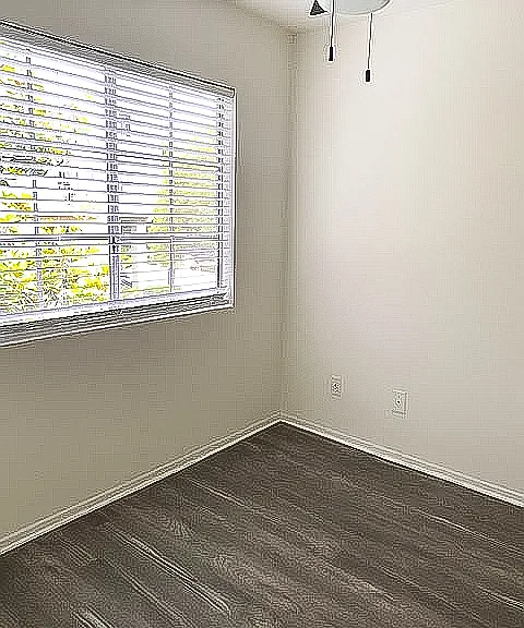 Carpet has been removed and this room now has LVT flooring.