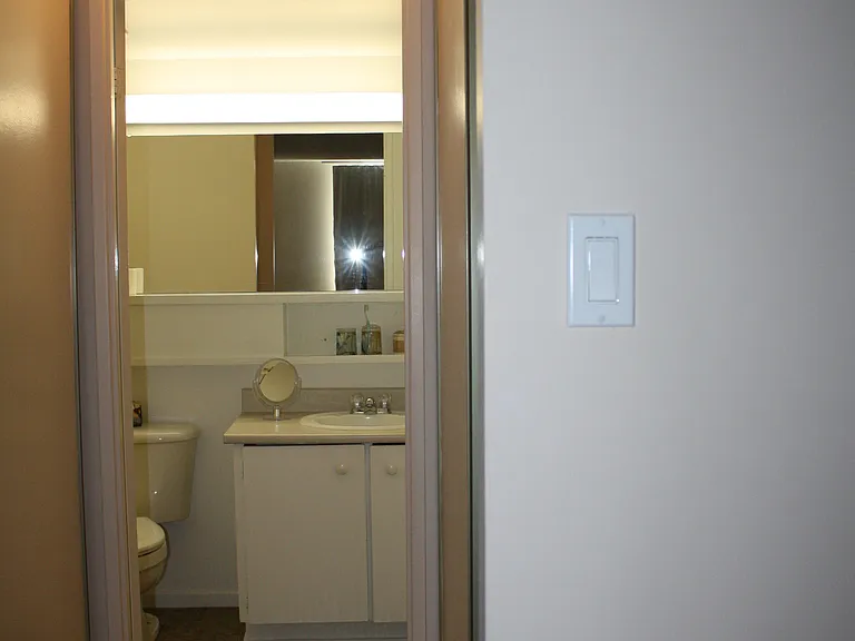 A look at the master bedroom bathroom with closets