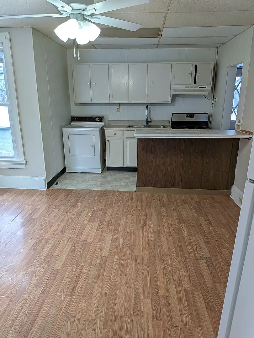 1106-1108 Gibbson MGMT — Photo 1