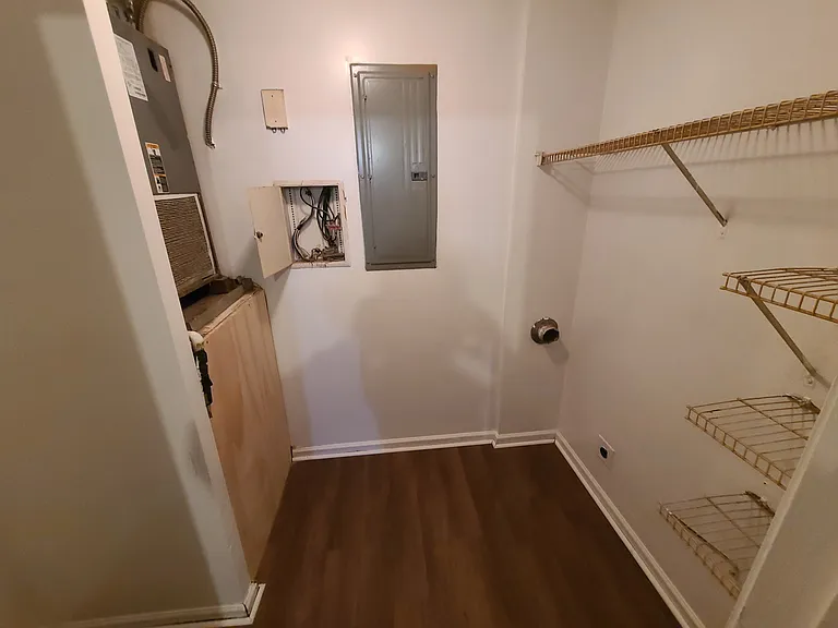 Laundry area with utilities